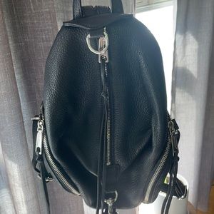 Black mini Julian Rebecca Minkoff backpack.